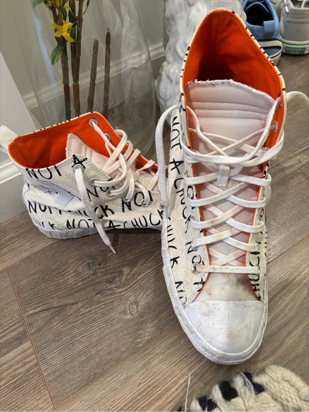 Converse High Top Sneakers in White with Orange Lining